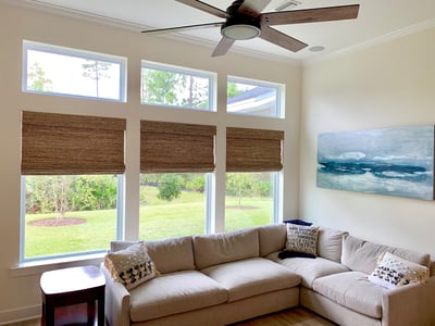 living room with woven wood shades