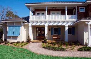 home with blue exterior Bahamas shutter